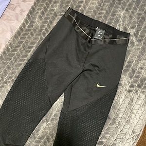 NikePro Dri-Fit Black Leggings with Gold Trim